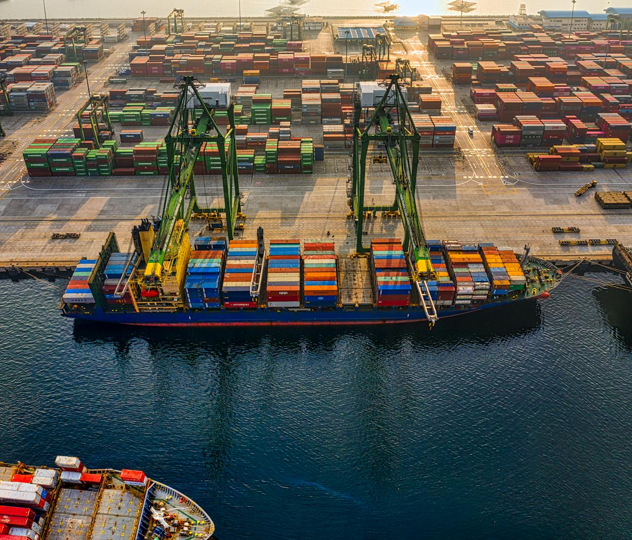 About Aerial shot of colorful shipping containers at North Jakarta's bustling port, Indonesia.